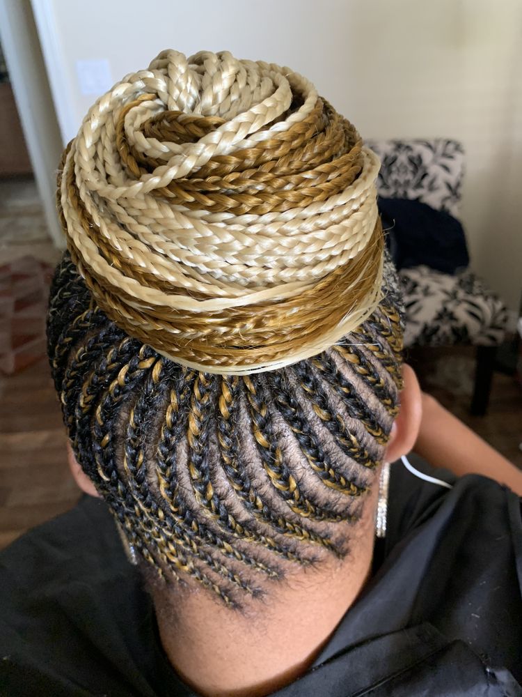 A woman with braids in her hair